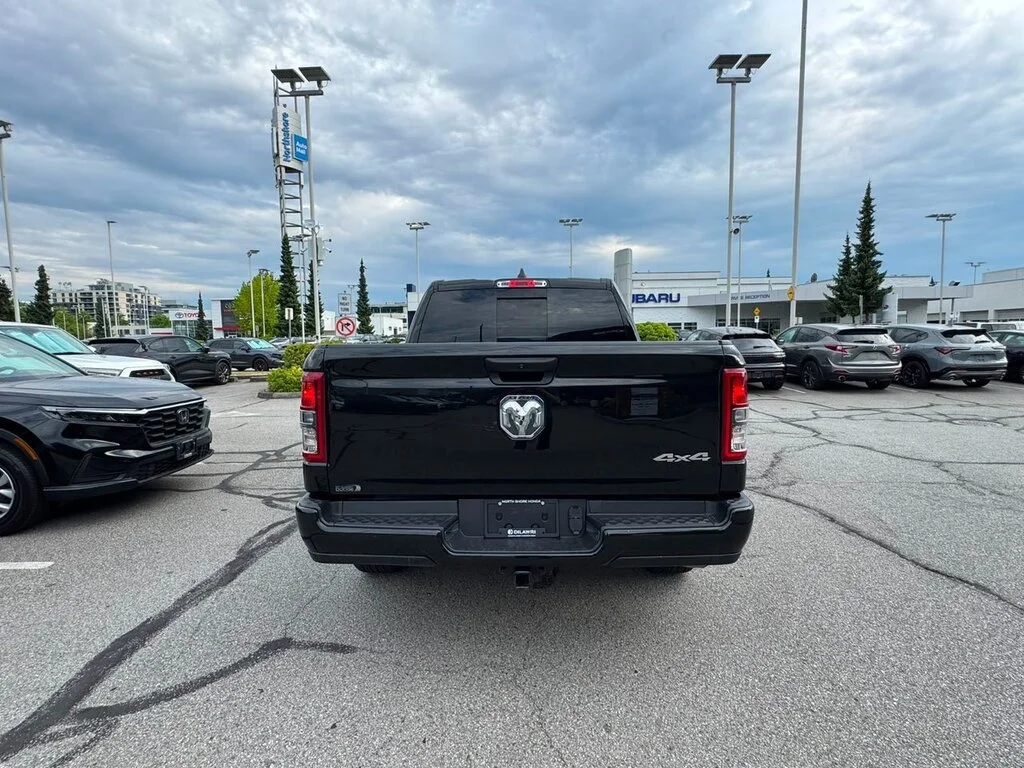 Used 2024 Diamond Black Crystal Pearl Ram Tradesman 4x4 Crew Cab 5