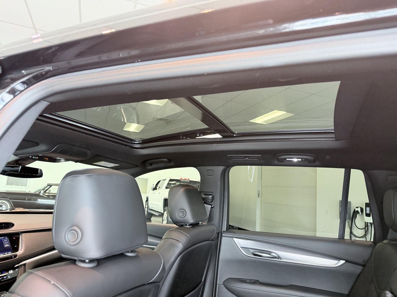 Used 2024 Stellar Black Metallic Cadillac AWD Luxury image 35
