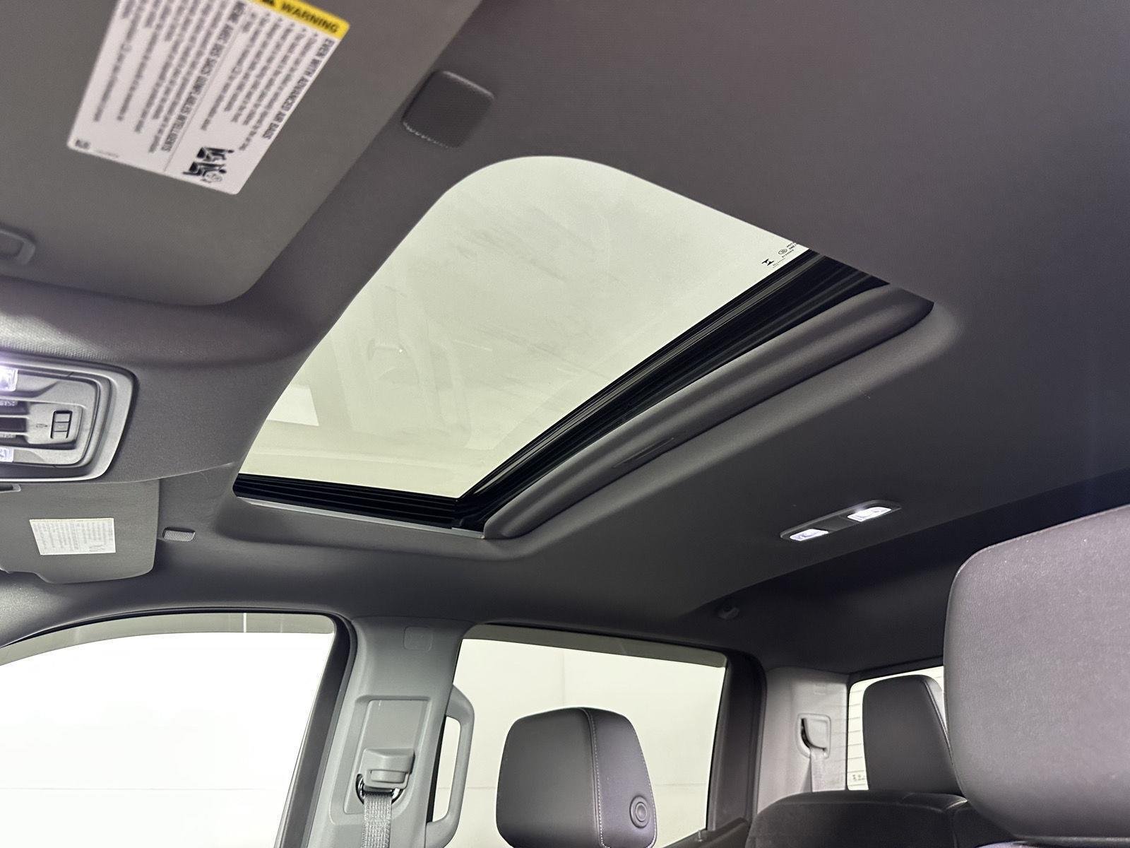 Used 2024 Titanium Rush Metallic GMC SLT image 8