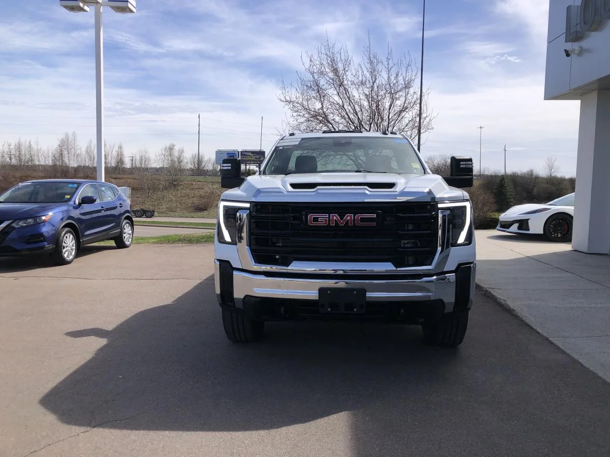 Used 2024 White GMC 4WD Reg Cab 142" Pro image 3