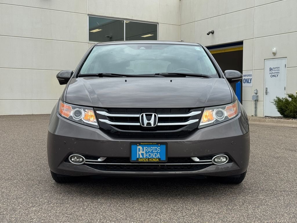 Used 2014 Honda Odyssey Touring with VIN 5FNRL5H96EB105312 for sale in Coon Rapids, Minnesota