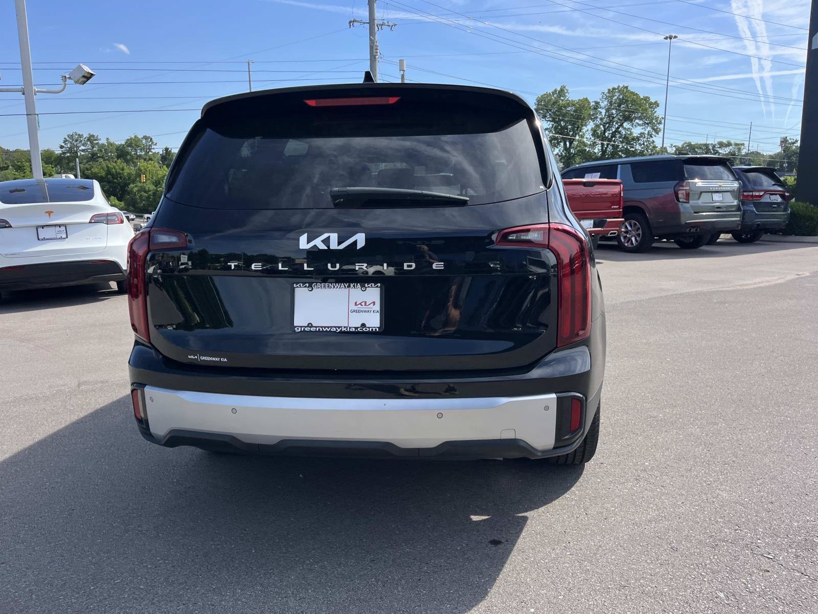 Used 2024 Ebony Black Kia LX image 4