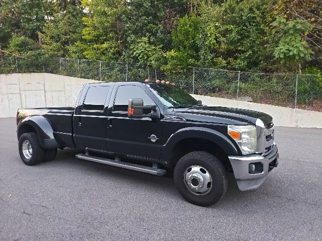Used 2014 Black Ford Lariat image 1