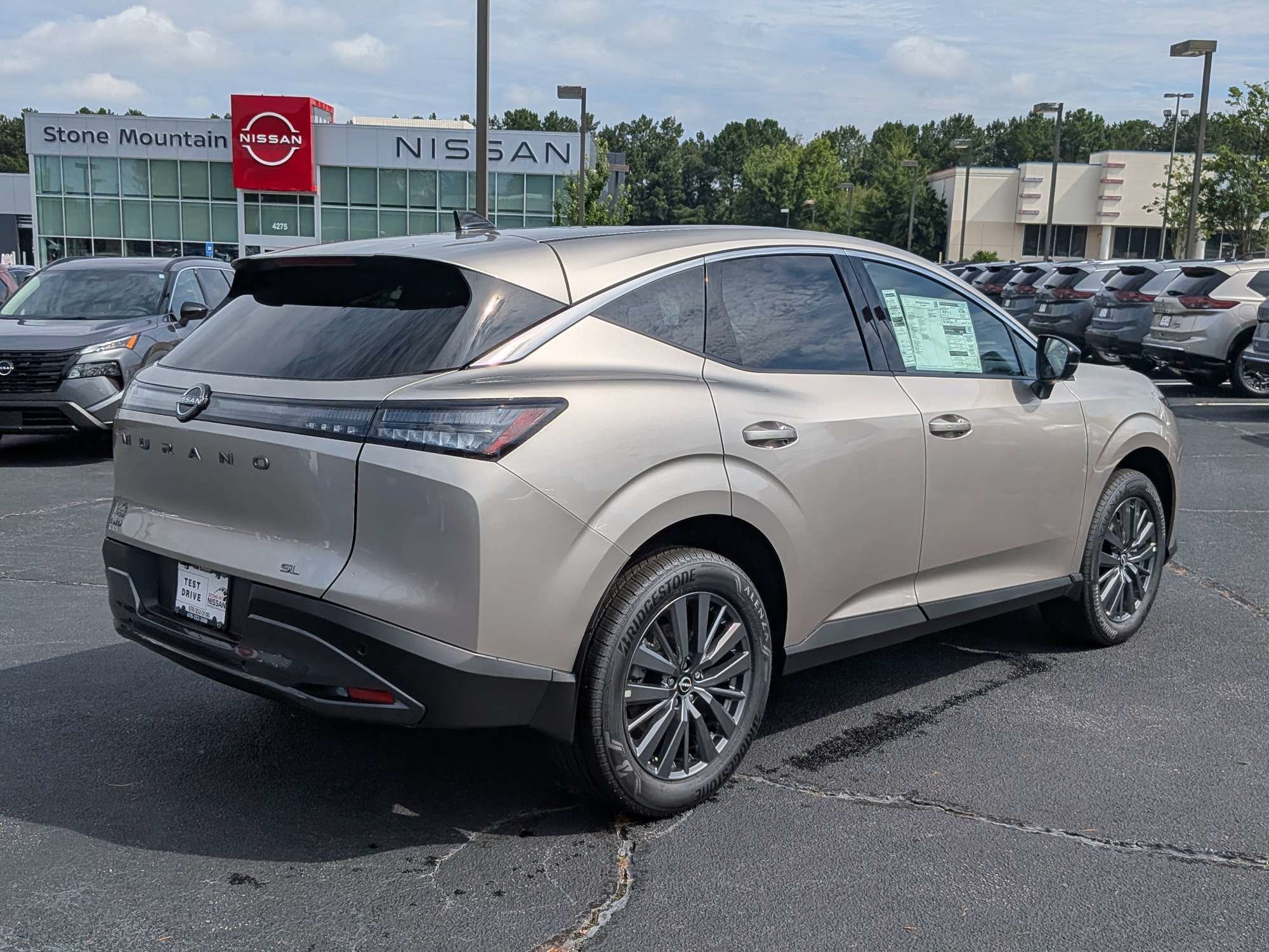 New 2026 Gold Nissan SL image 3
