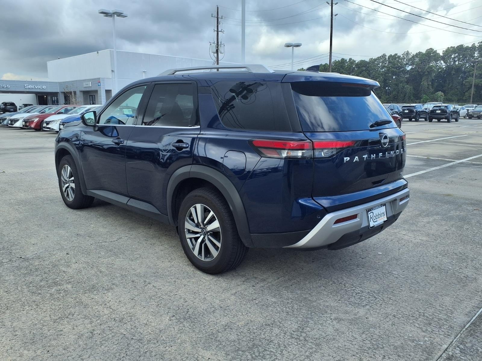Certified Used 2025 Deep Ocean Blue Pearl Nissan SL image 4