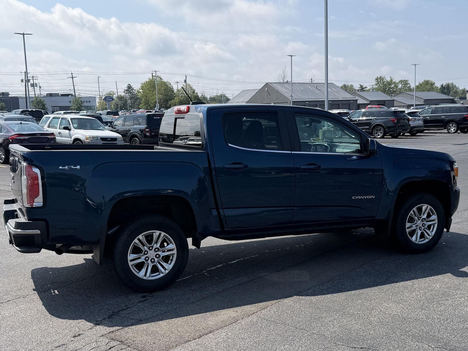 Used 2020 Blue Emerald Metallic GMC 4WD SLE image 4