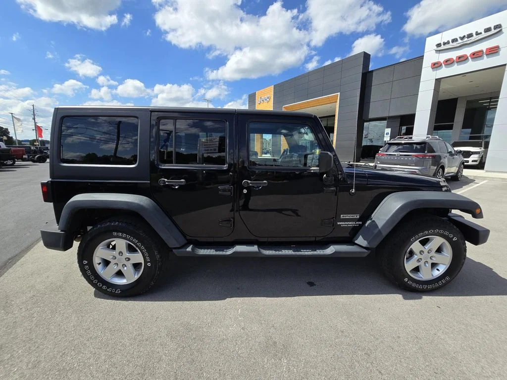 Used 2014 Black Clearcoat Jeep Sport image 11