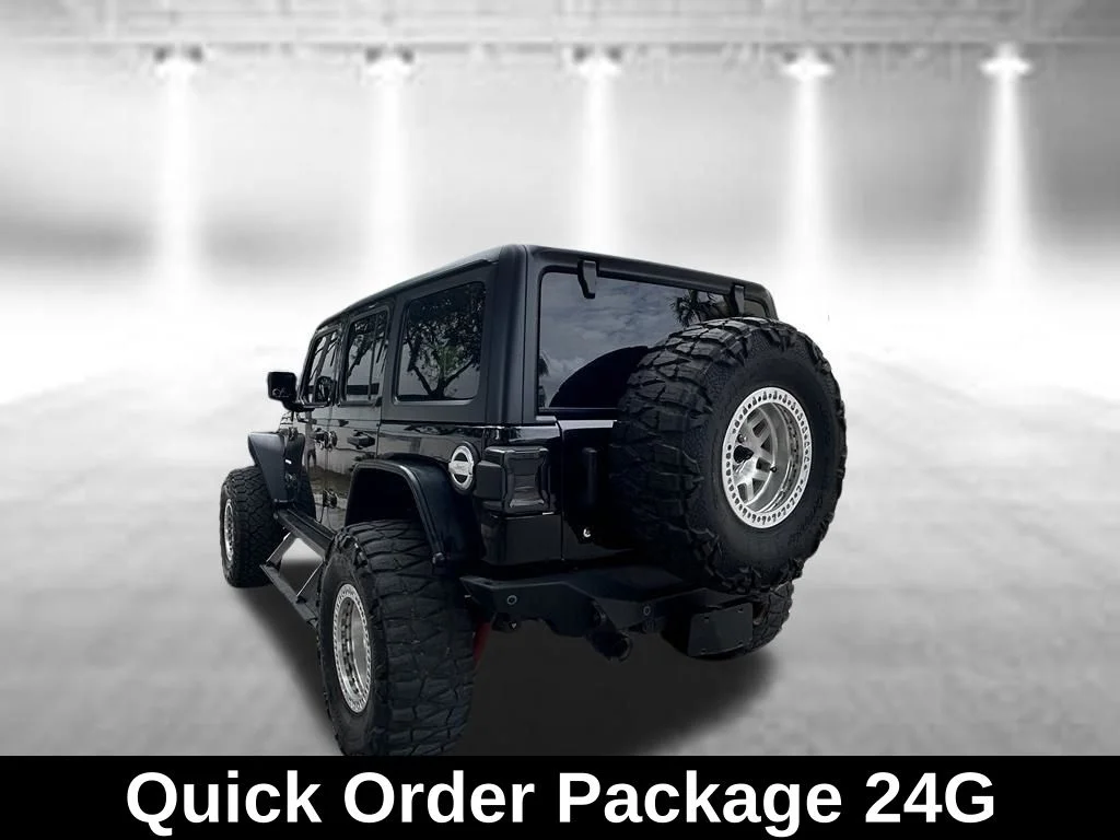 Used 2018 Black Jeep Unlimited Sahara image 4