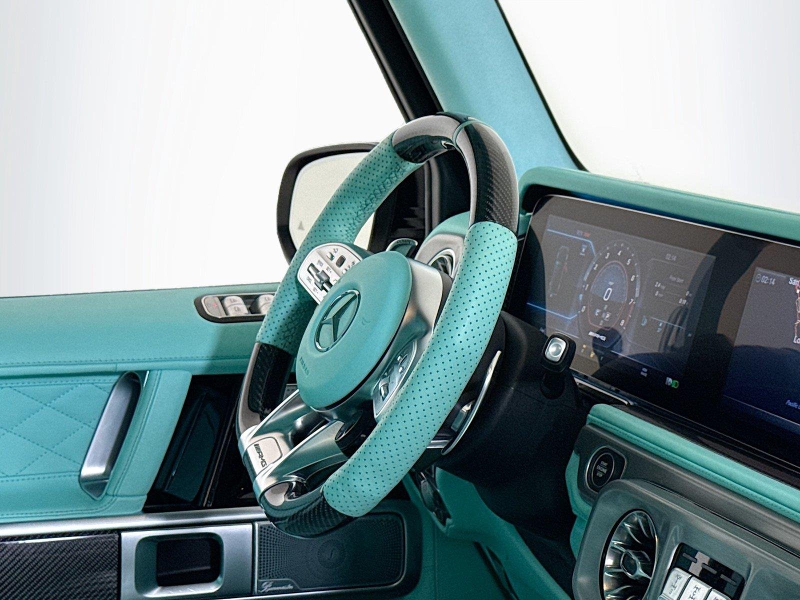 Used 2024 Polar White Mercedes-Benz AMG® G 63  Brabus Custom Widebody / Custom Tiffany Interior image 32
