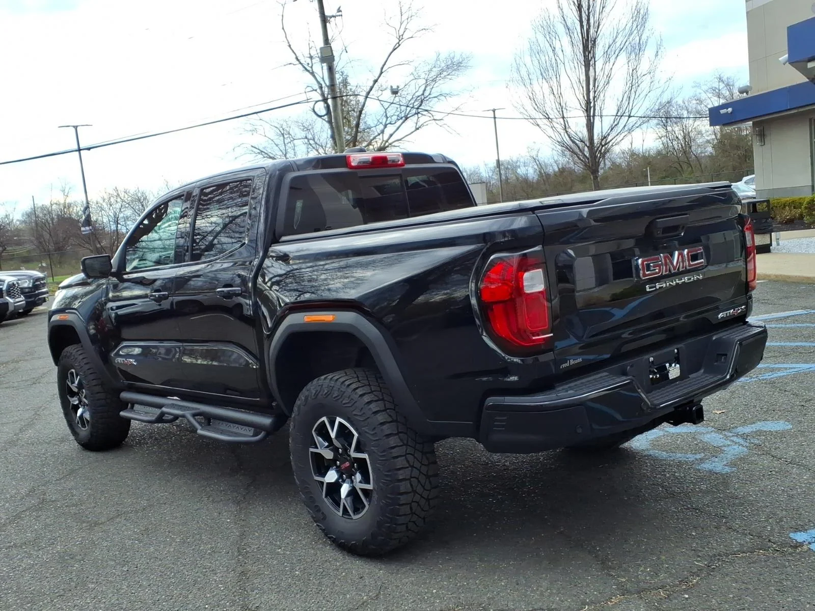 Used 2024 Onyx Black GMC AT4X image 6