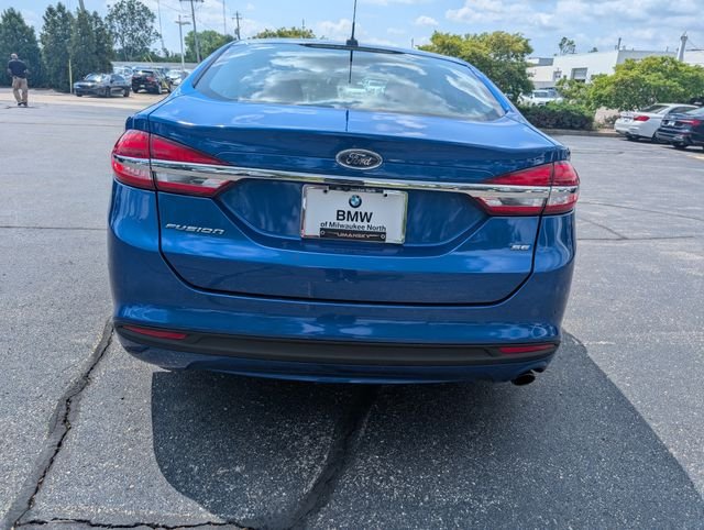 Used 2017 Lightning Blue Ford SE image 4