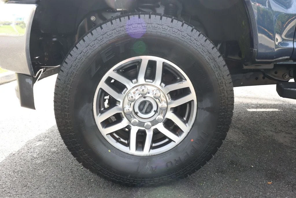 Used 2019 Blue Jeans Metallic Ford LARIAT 4WD Crew Cab 6.75