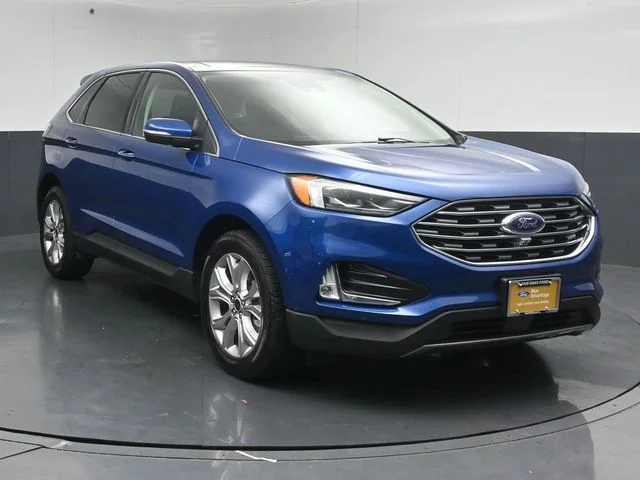 Certified Used 2024 Atlas Blue Metallic Ford Titanium image 1