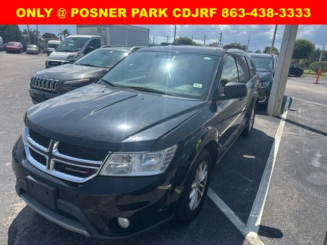 Used 2017 Black Dodge SXT image 1