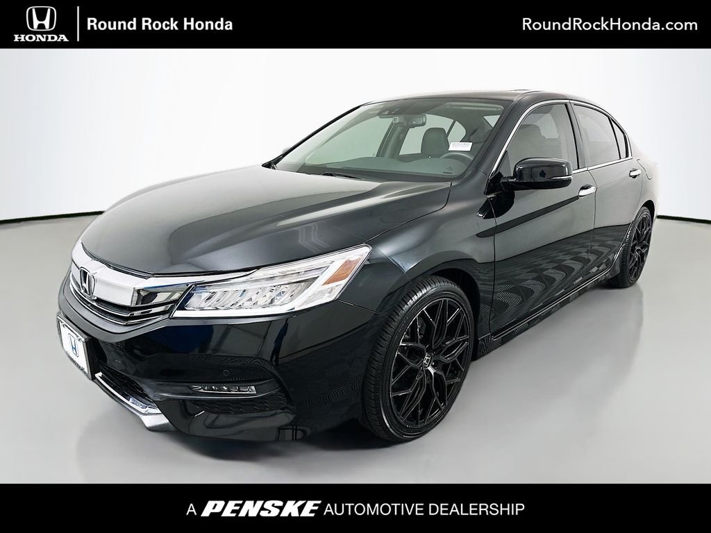 Used 2017 Crystal Black Pearl Honda Touring image 1