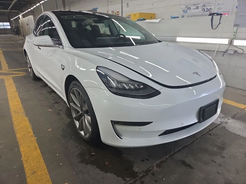 Used 2018 Tesla Model 3 Long Range Dual Motor with VIN 5YJ3E1EB8JF134272 for sale in Parma, OH