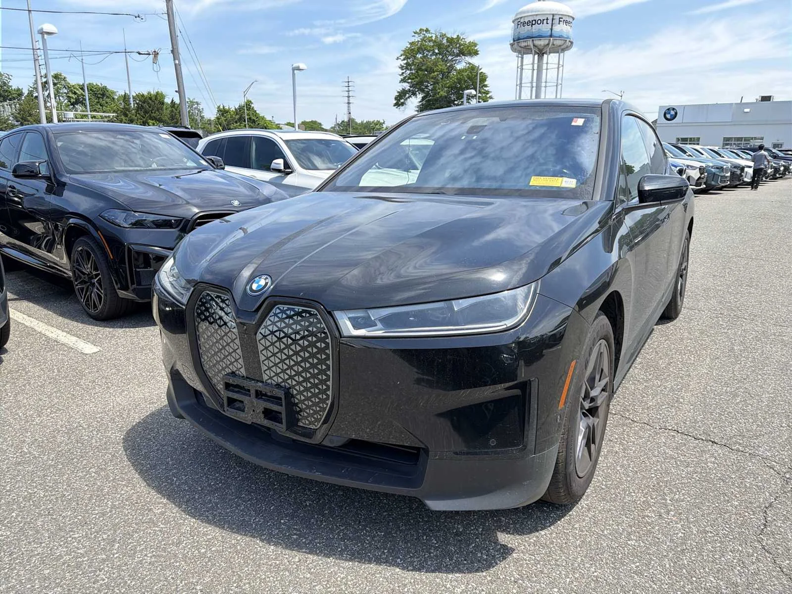 Used 2024 Black Sapphire Metallic BMW xDrive50 image 3