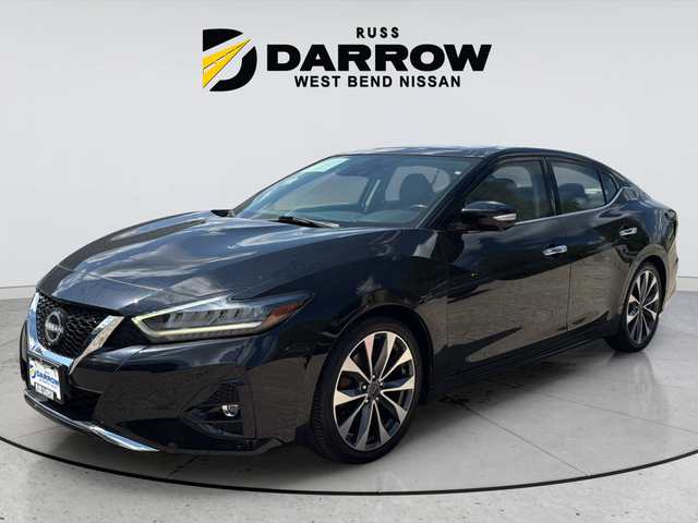 Used 2023 Black Nissan Platinum image 1
