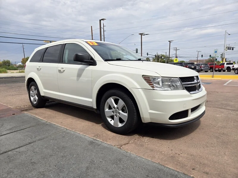 Used 2013 White Dodge American Value Pkg image 4