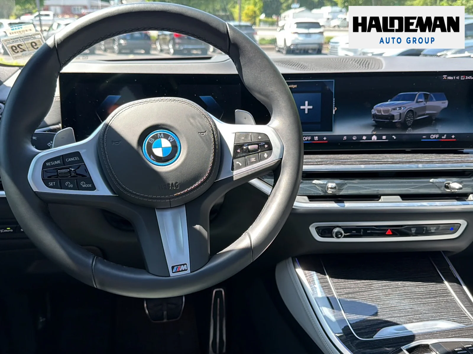 Used 2025 Brooklyn Gray Metallic BMW xDrive50e image 13