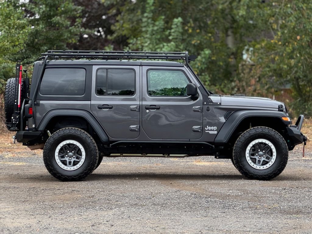 Used 2018 Granite Crystal Metallic Clearcoat Jeep Unlimited Sport S image 7
