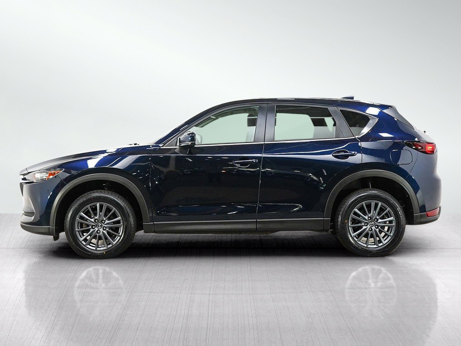 Used 2021 Deep Crystal Blue Mica Mazda Touring AWD image 2