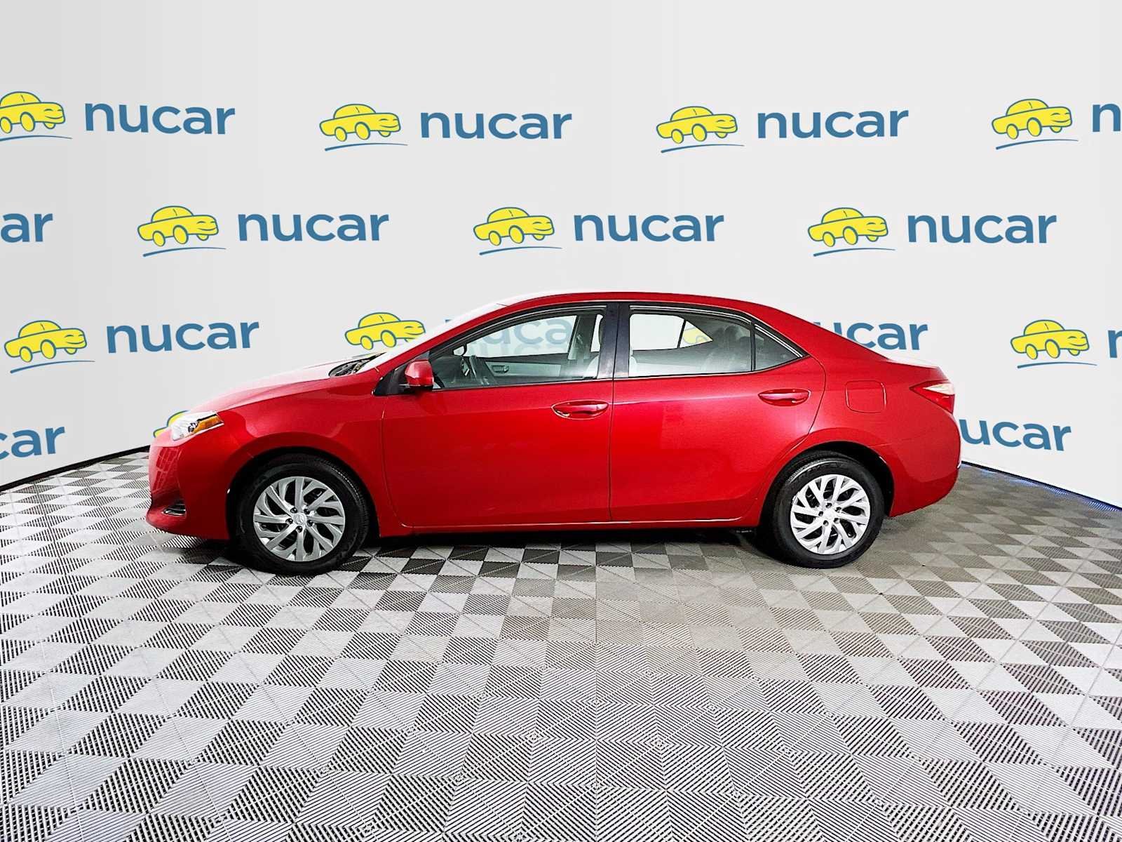 Used 2017 Barcelona Red Metallic Toyota LE image 4