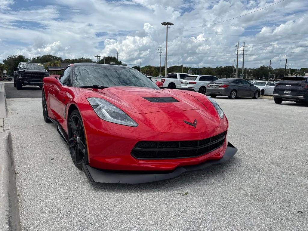 Used 2015 Torch Red Chevrolet Stingray Z51 image 1