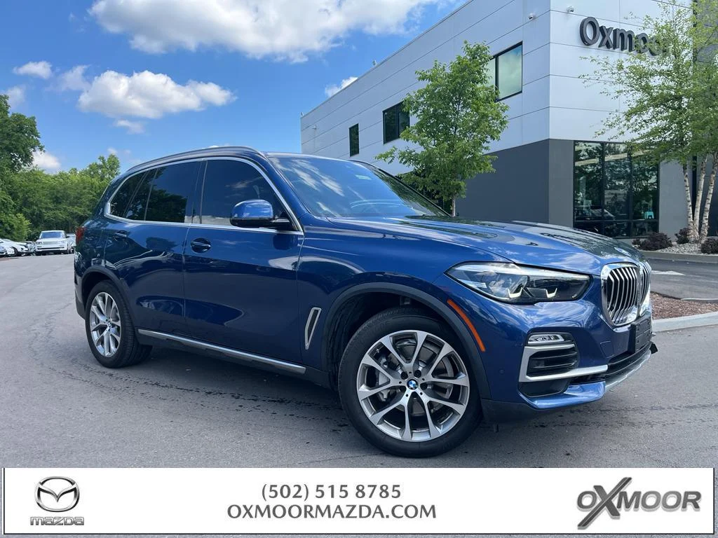 Used 2019 Phytonic Blue Metallic BMW xDrive40i image 1