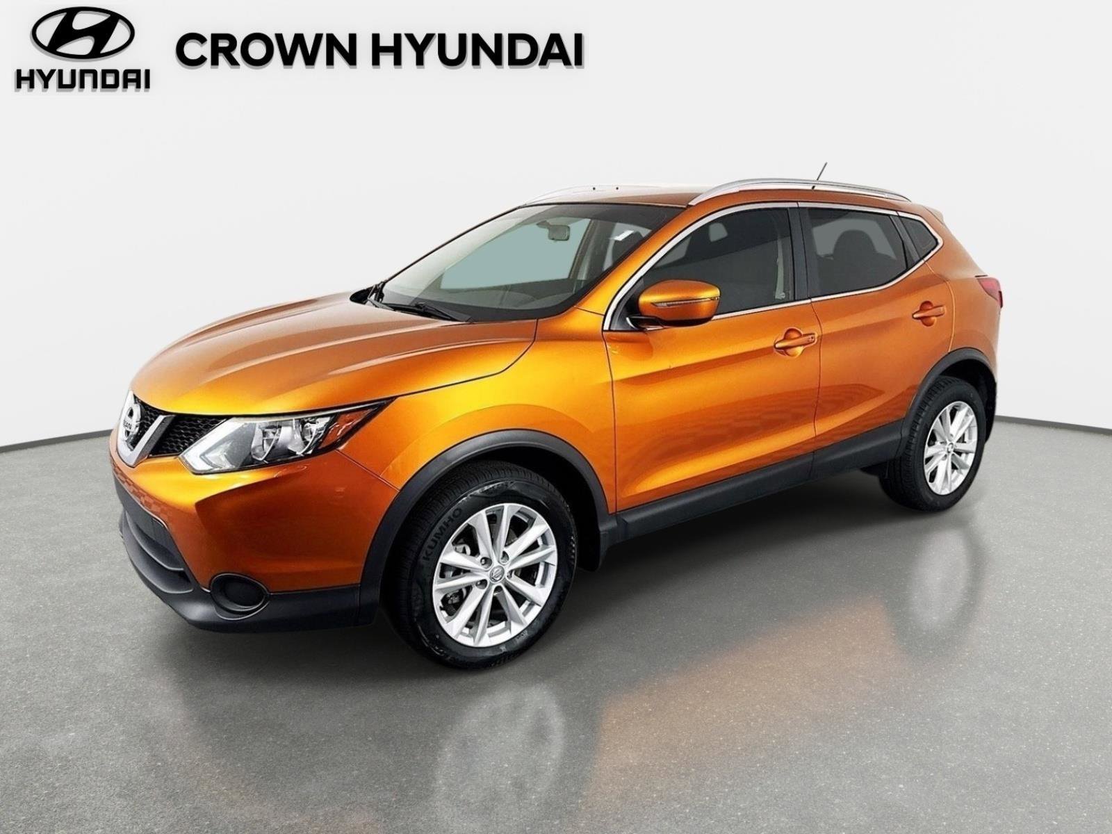 Used 2017 Monarch Orange Nissan SV image 1