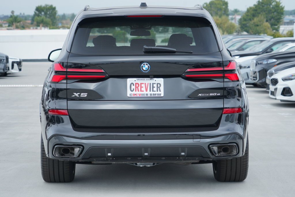 New 2026 Black Sapphire Metallic BMW xDrive50e image 7
