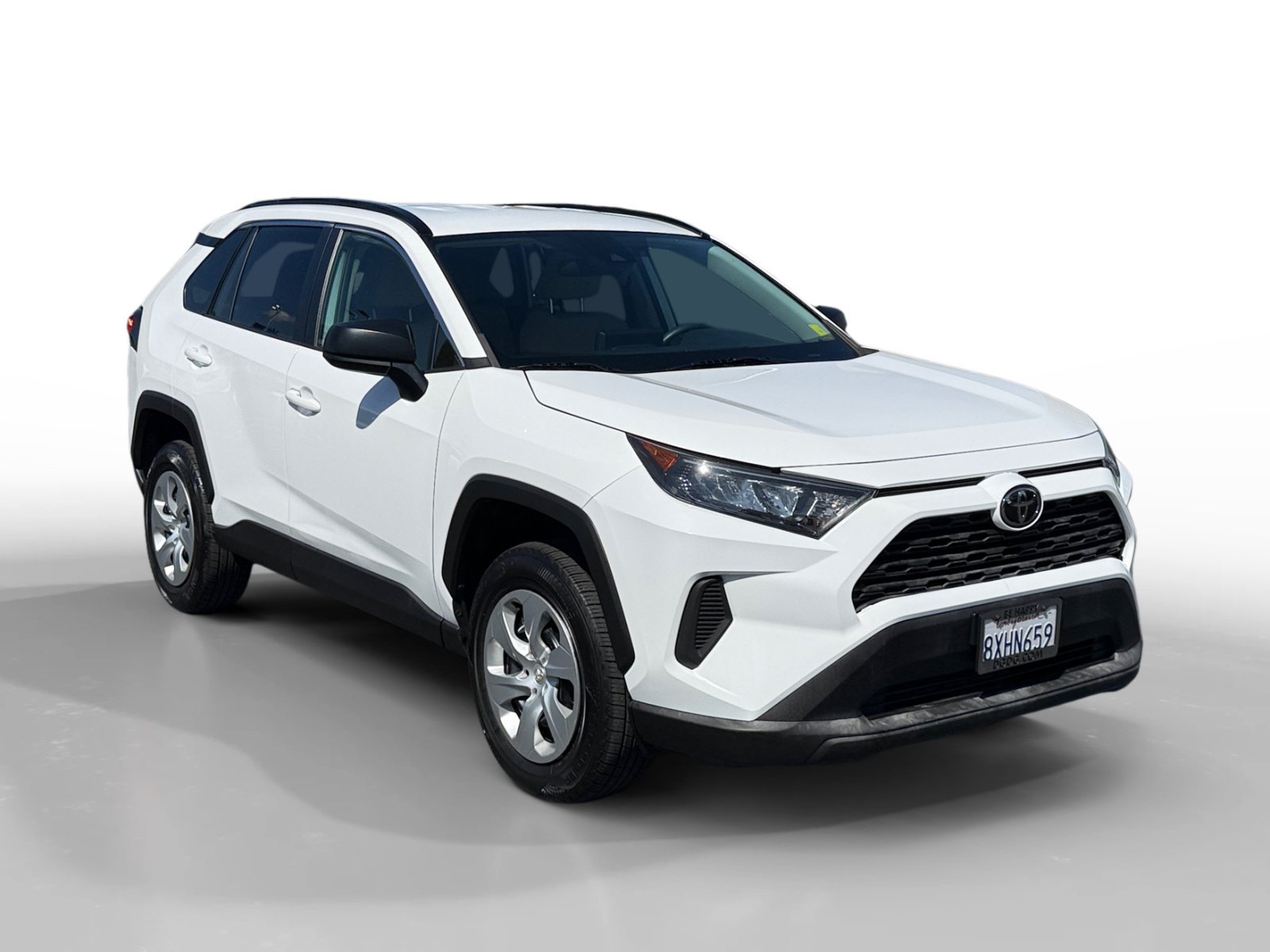 Used 2021 Super White Toyota LE image 7