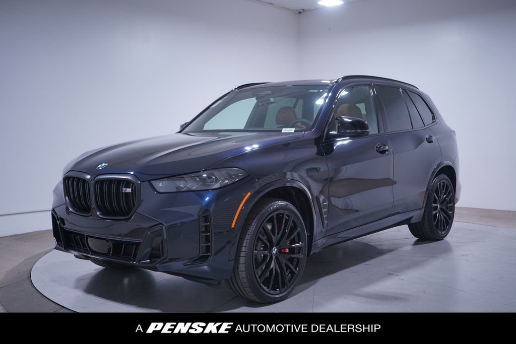 Used 2026 Carbon Black Metallic BMW M60i image 1