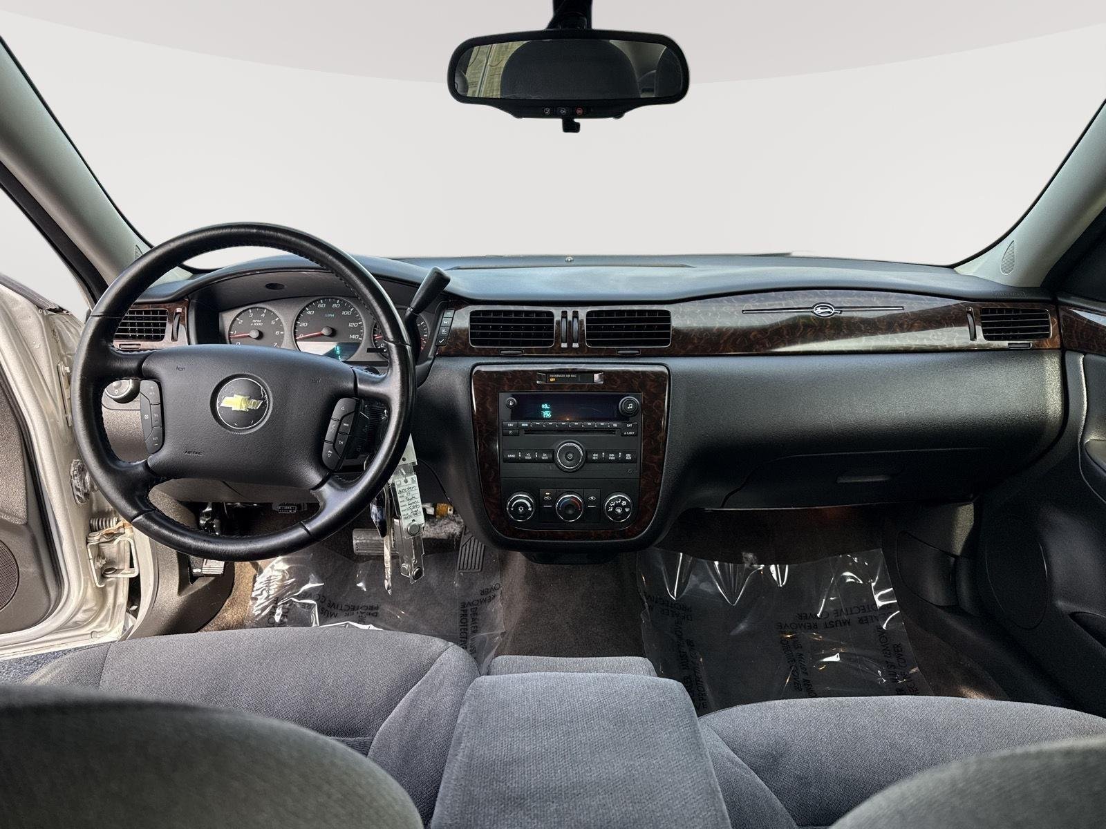 Used 2014 Silver Ice Metallic Chevrolet LS image 4