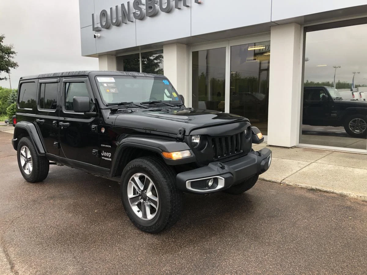 Used 2019 Black Jeep Unlimited Sahara 4x4 image 1