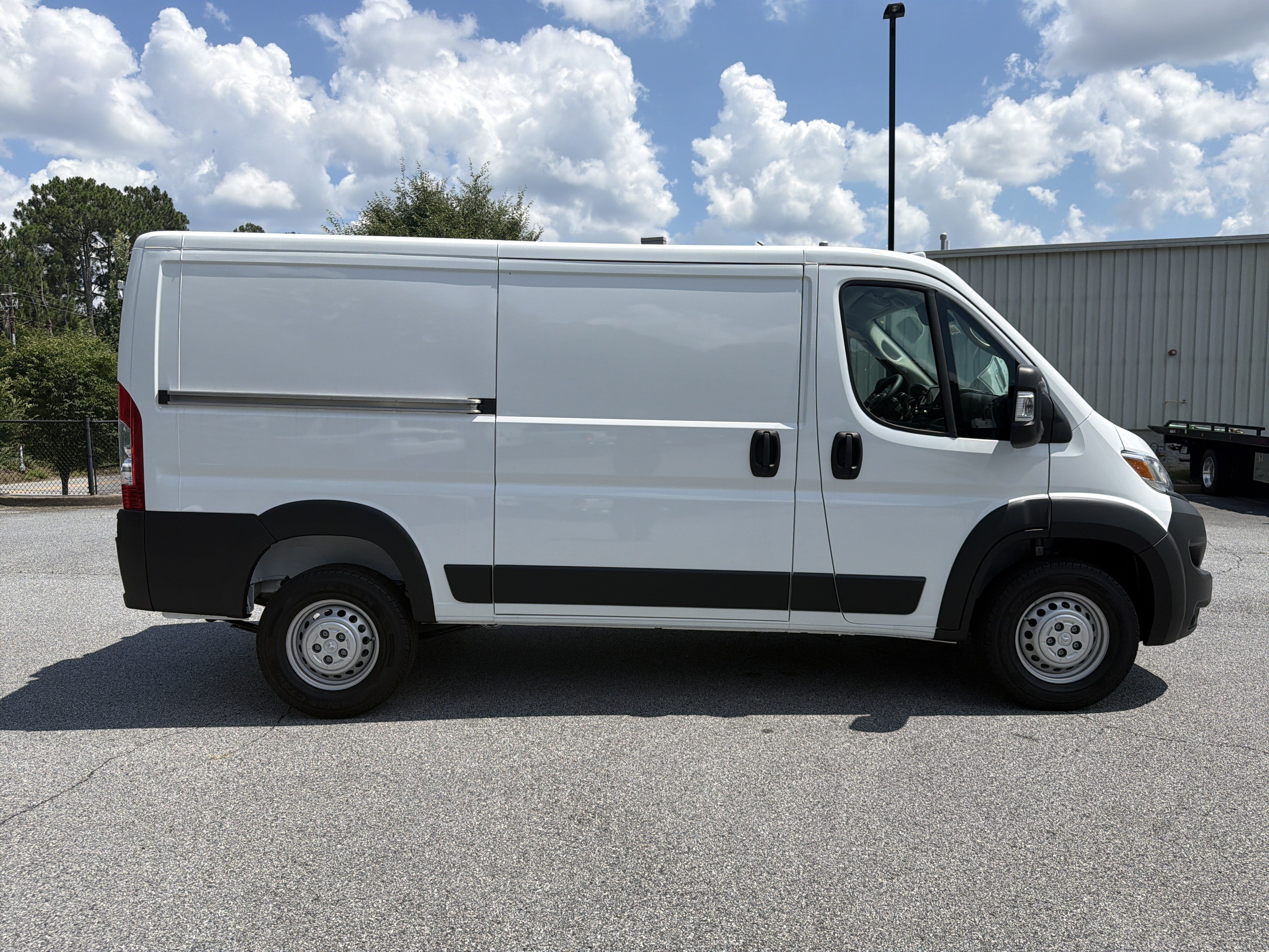 New 2026 Bright White Clearcoat RAM Low Roof image 9