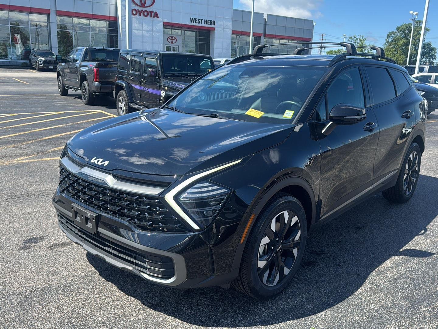 Used 2024 Ebony Black Kia X-Line image 3