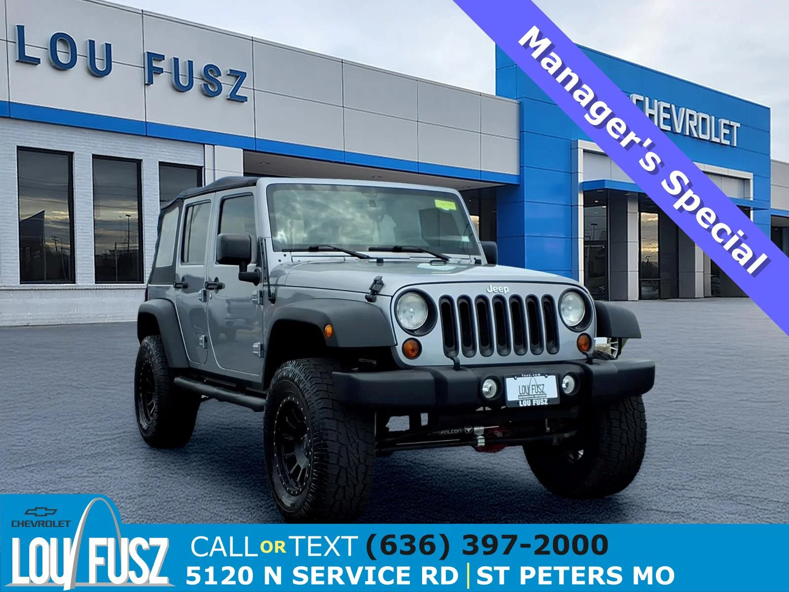 Used 2013 Billet Silver Metallic Jeep Sport image 1