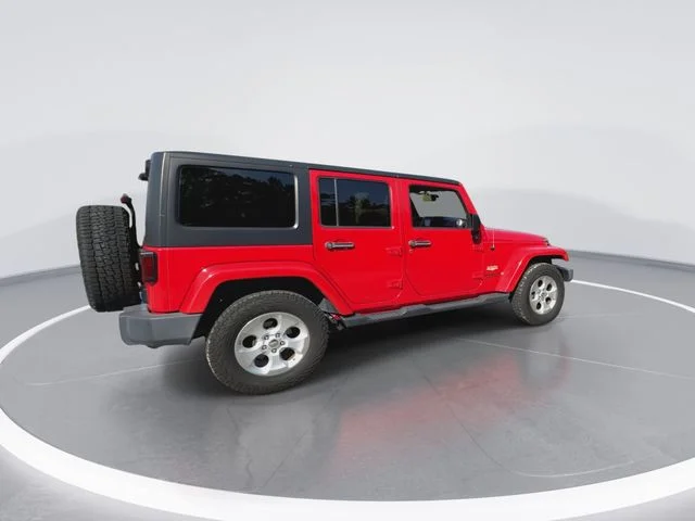 Used 2014 Red Jeep Unlimited Sahara image 11