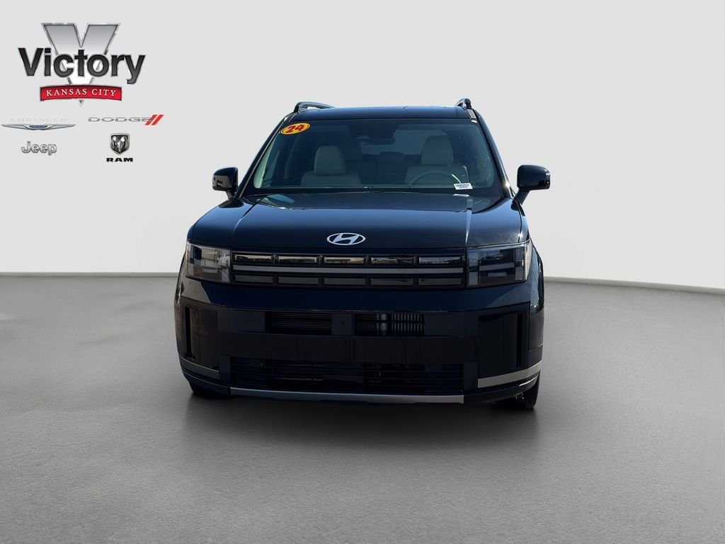 Used 2024 Hyundai Santa Fe Limited HEV with VIN 5NMP34G10RH002033 for sale in Kansas City