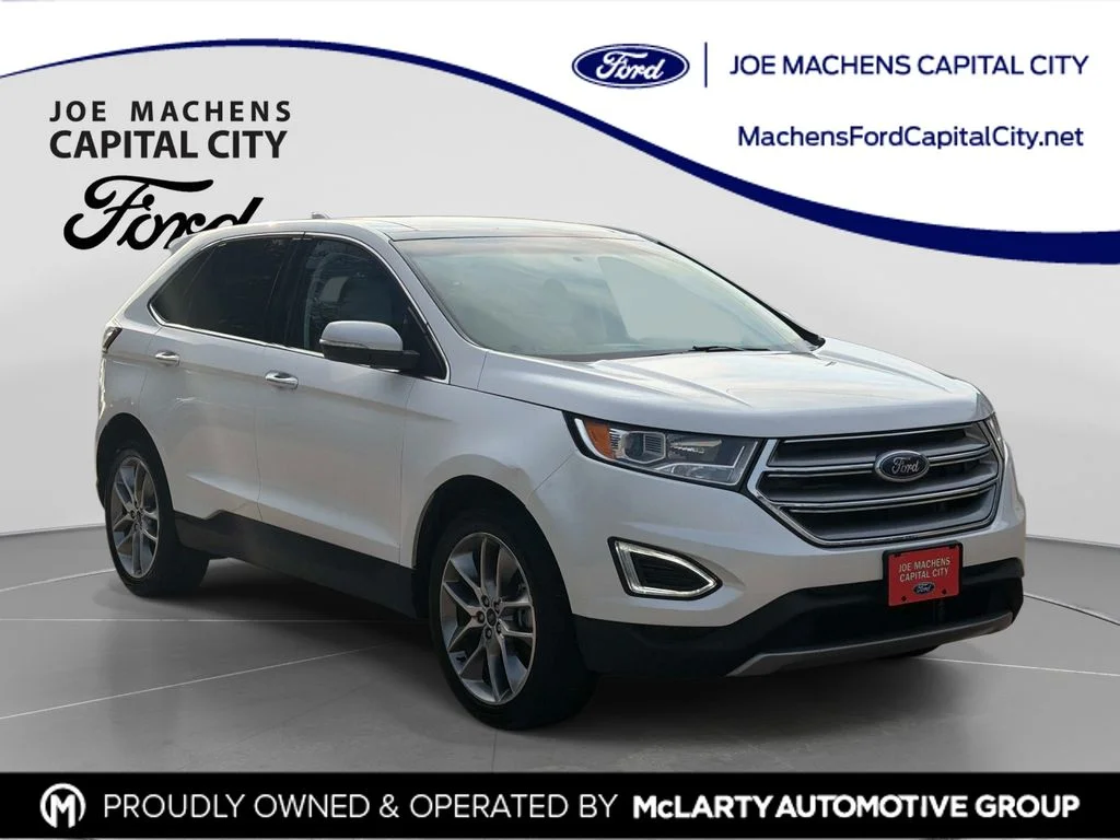 Used 2016 White Ford Titanium image 1