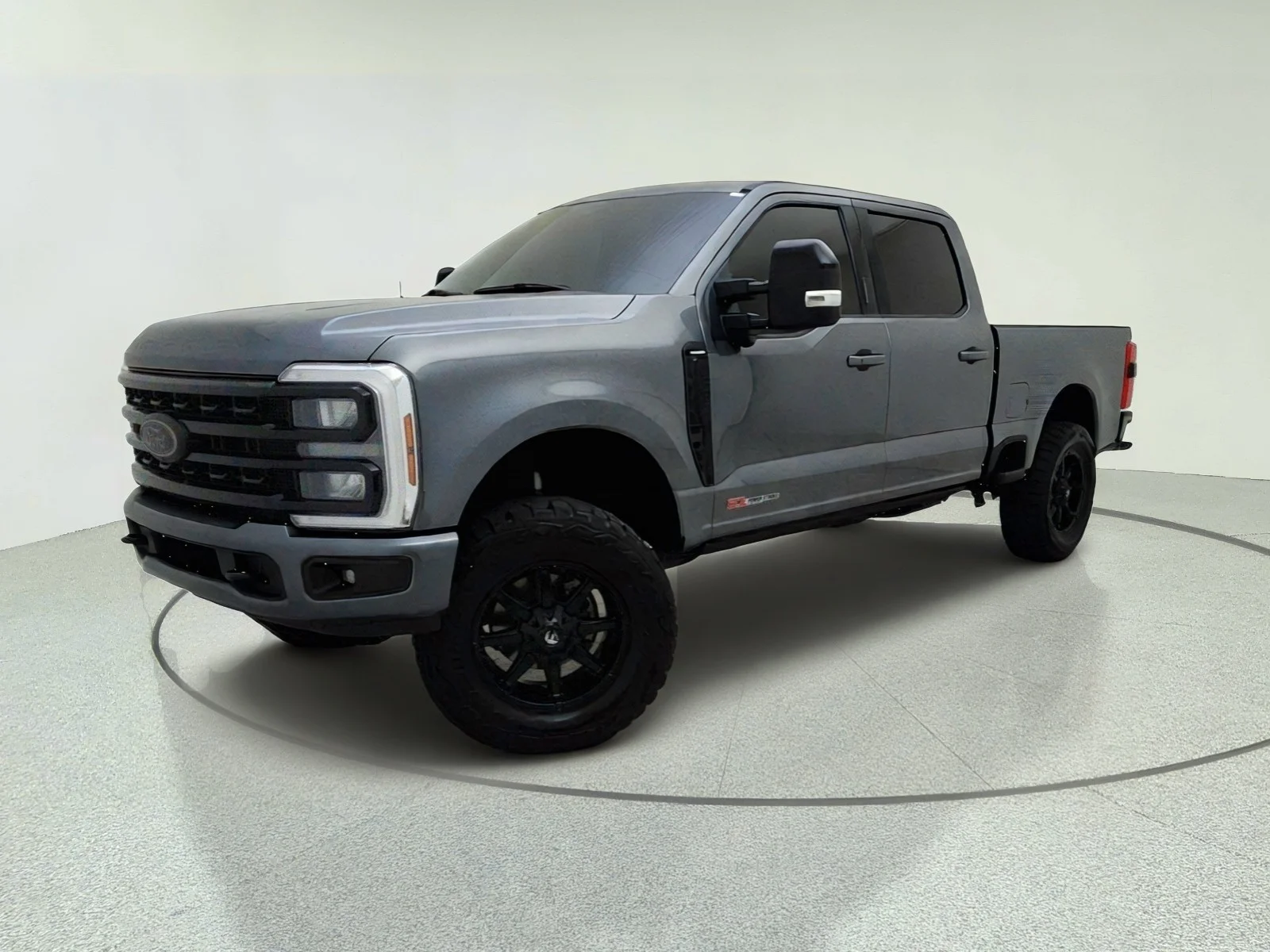 Used 2024 CARBONIZED GRAY Ford LARIAT image 1