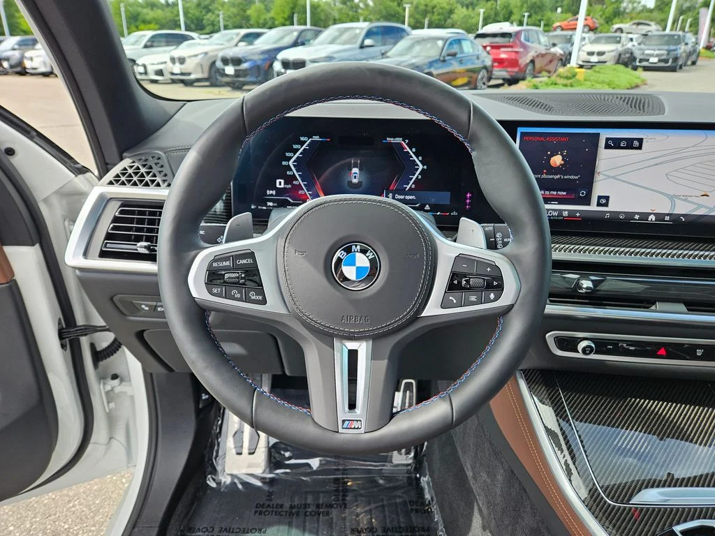 Used 2026 Mineral White Metallic BMW M60i image 27
