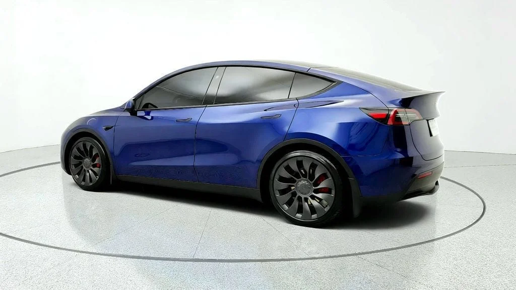 Used 2024 Deep Blue Metallic Tesla Performance AWD image 7