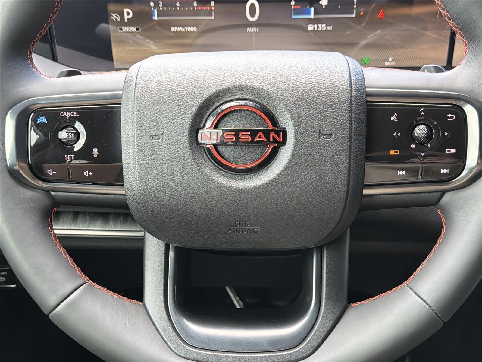 Used 2025 Aspen White Tricoat/Super Black Nissan PRO-4X image 18