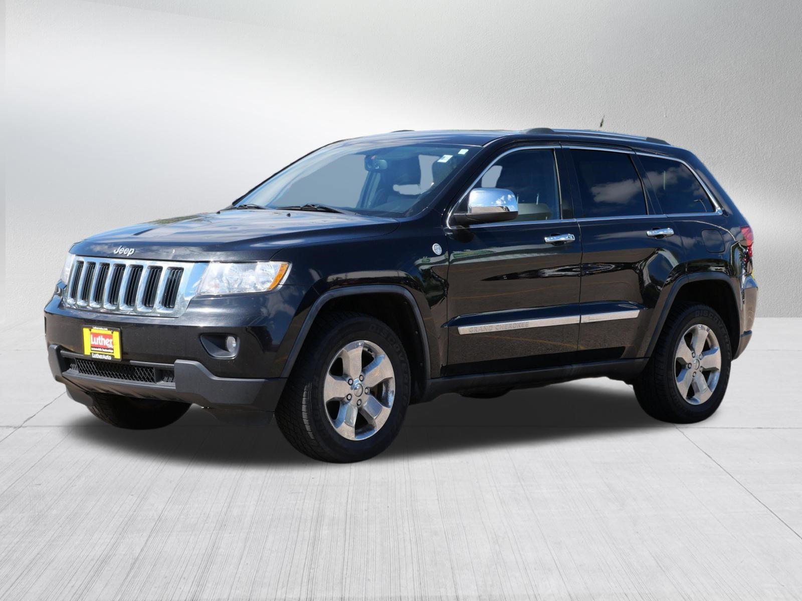 Used 2011 Brilliant Black Crystal Pearl Jeep Laredo image 3
