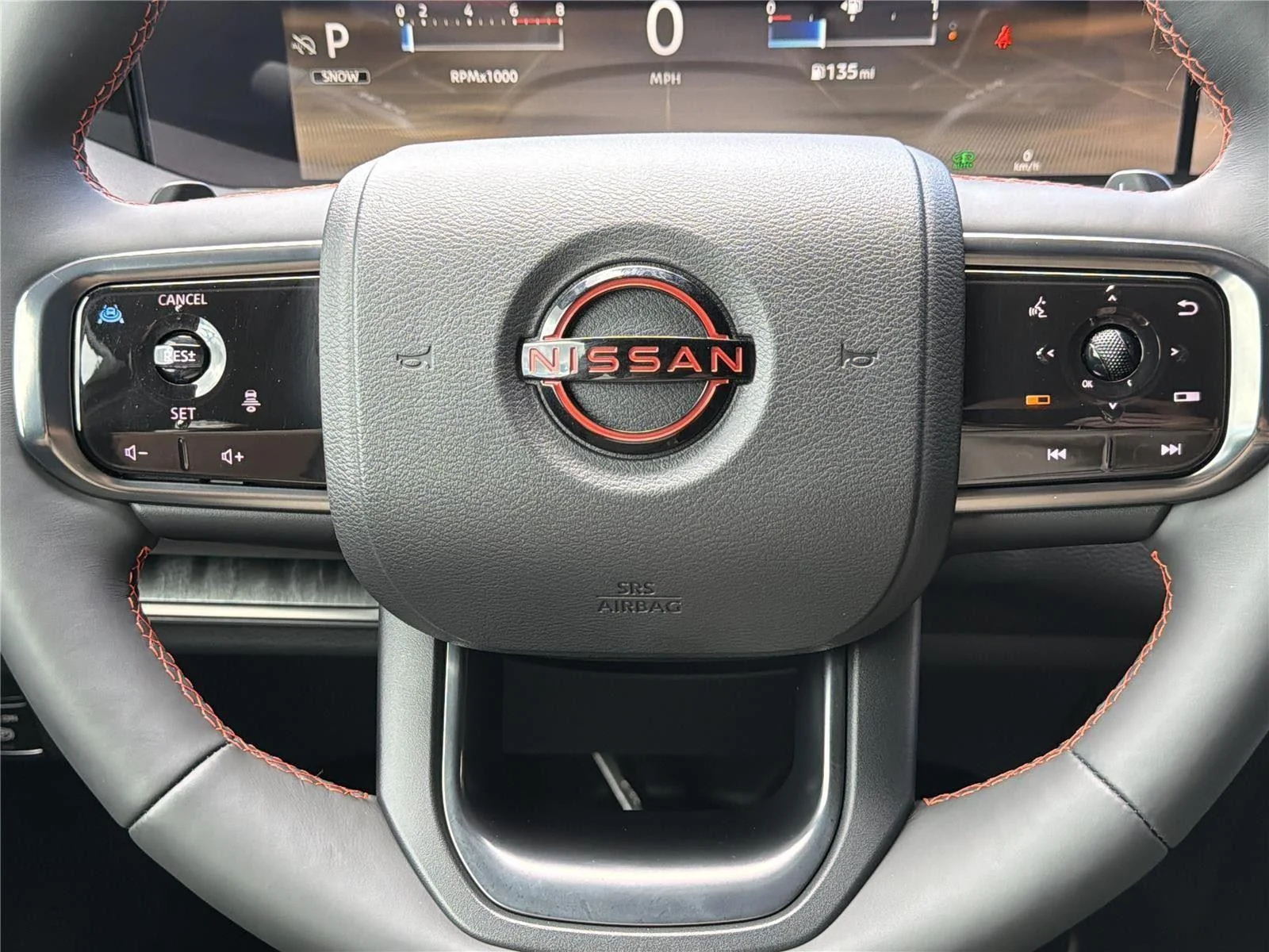 Used 2025 Aspen White Tricoat/Super Black Nissan PRO-4X image 18