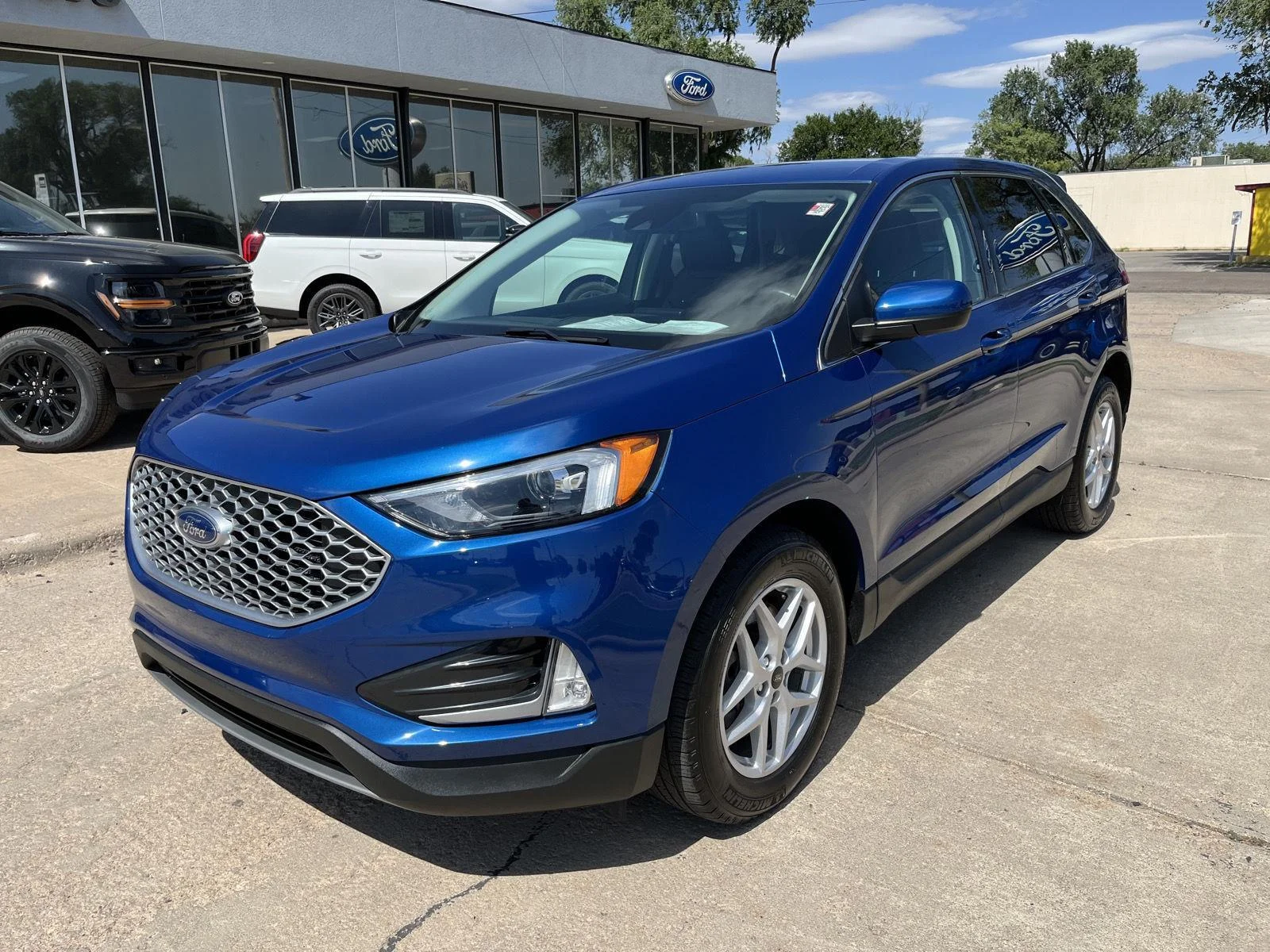 Certified Used 2023 Atlas Blue Metallic Ford SEL image 2