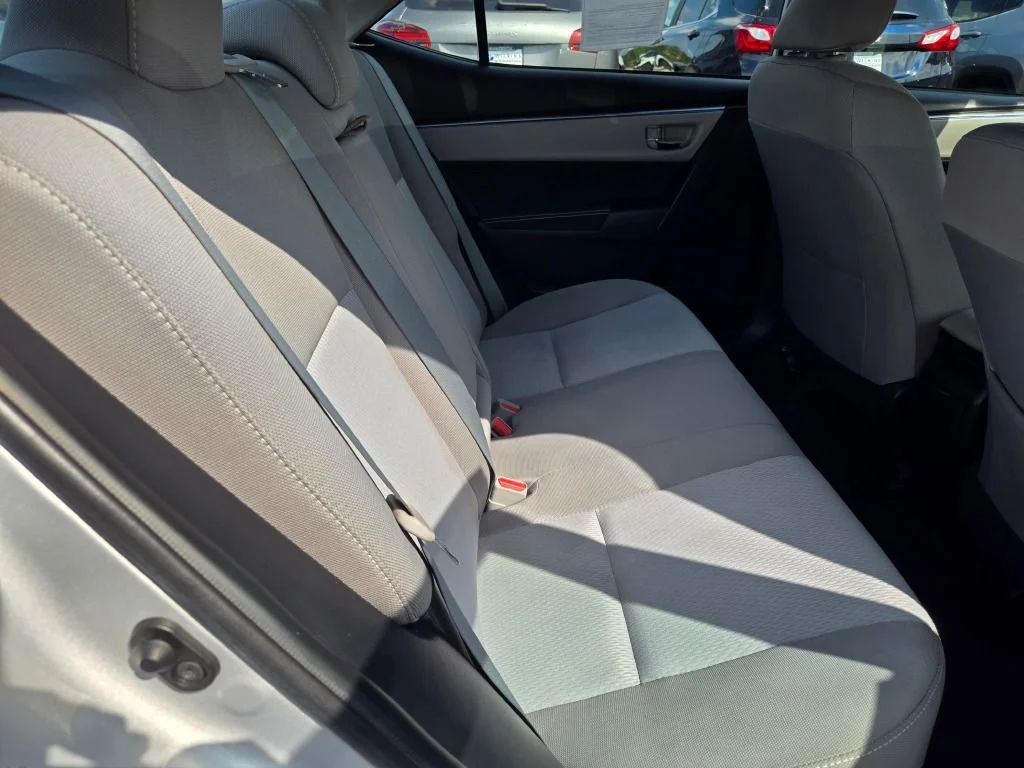 Used 2016 Classic Silver Metallic Toyota LE image 9
