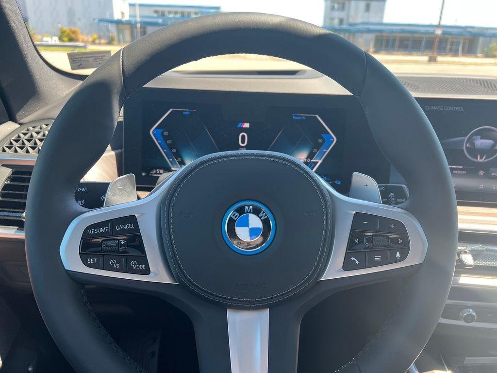 New 2026 Black Sapphire Metallic BMW xDrive50e image 16